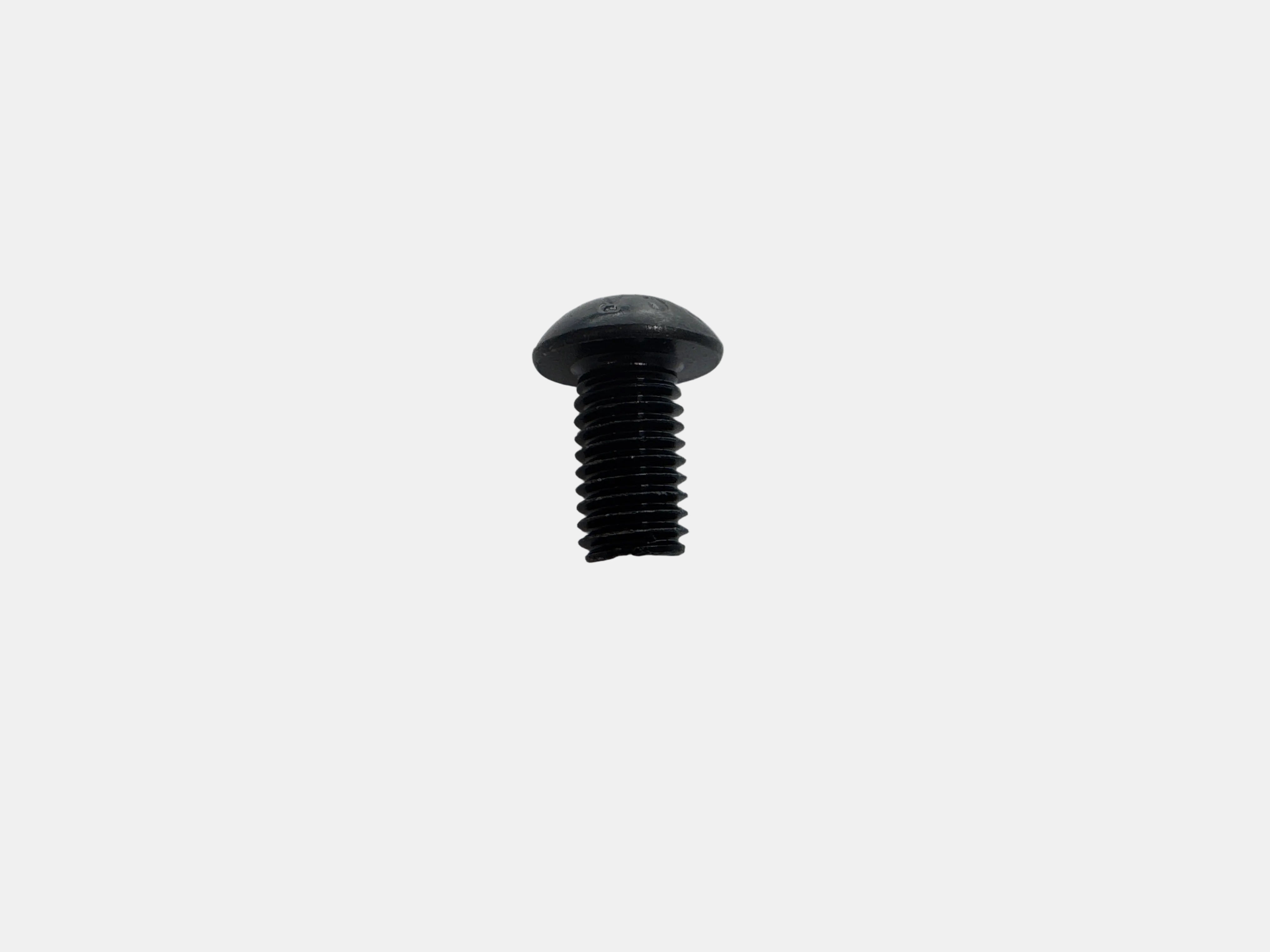 A single small black plastic cap screw with a threaded shank, photographed on a plain light gray background.