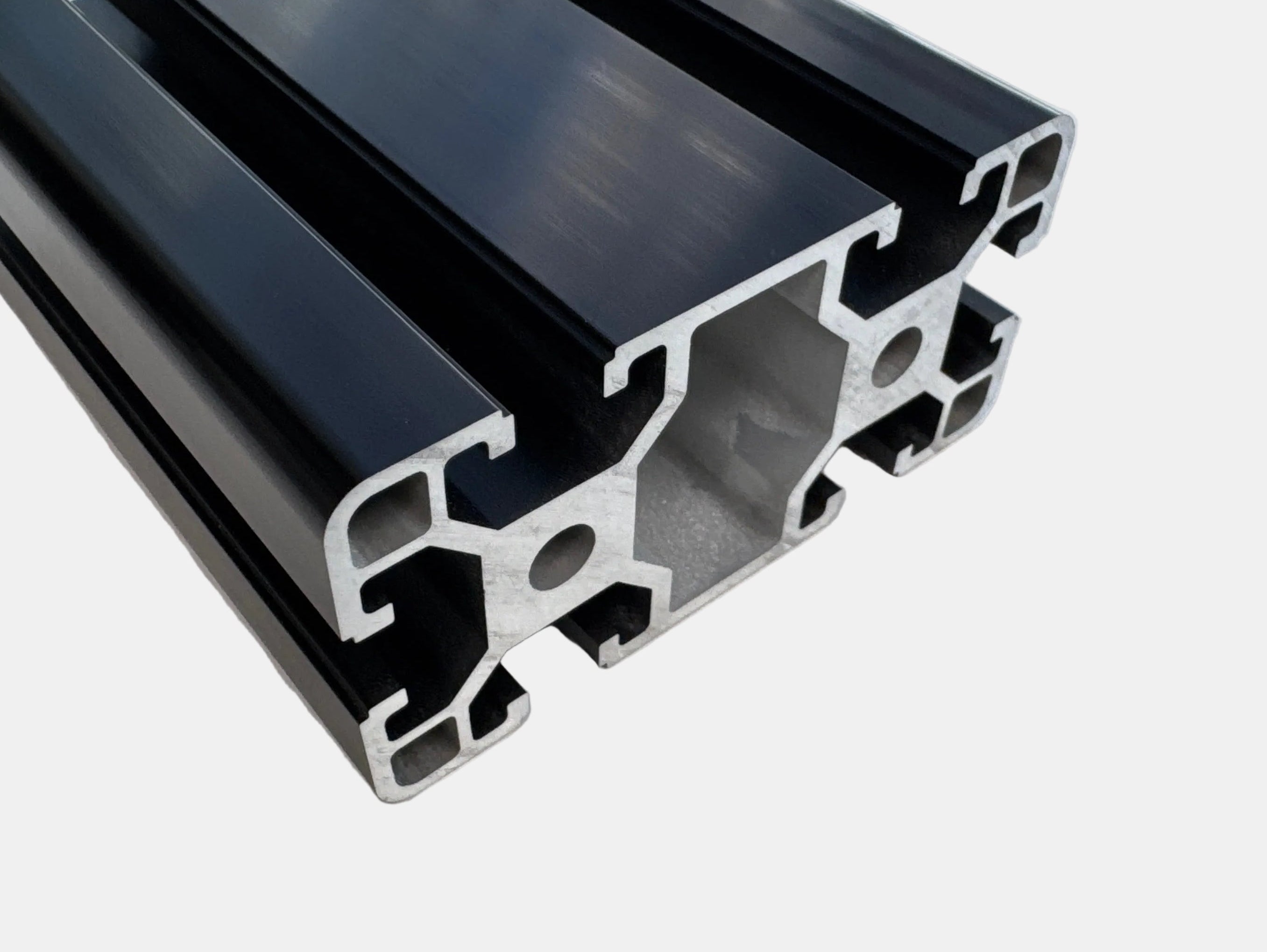 Black aluminum extrusion profile tube with a hollow cross-section, shown on a light gray background.