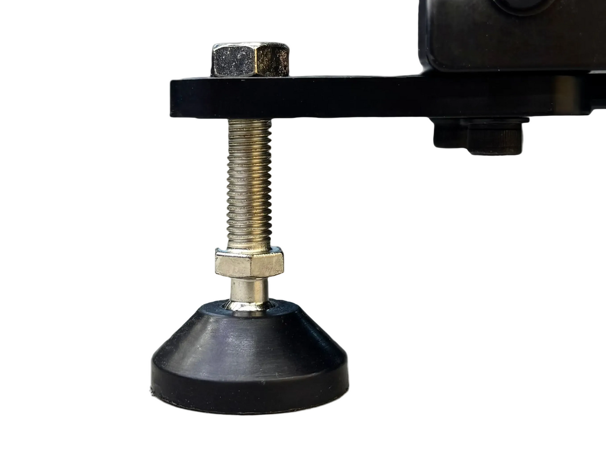 Close-up of a metal bolt and black rubber foot on a white background