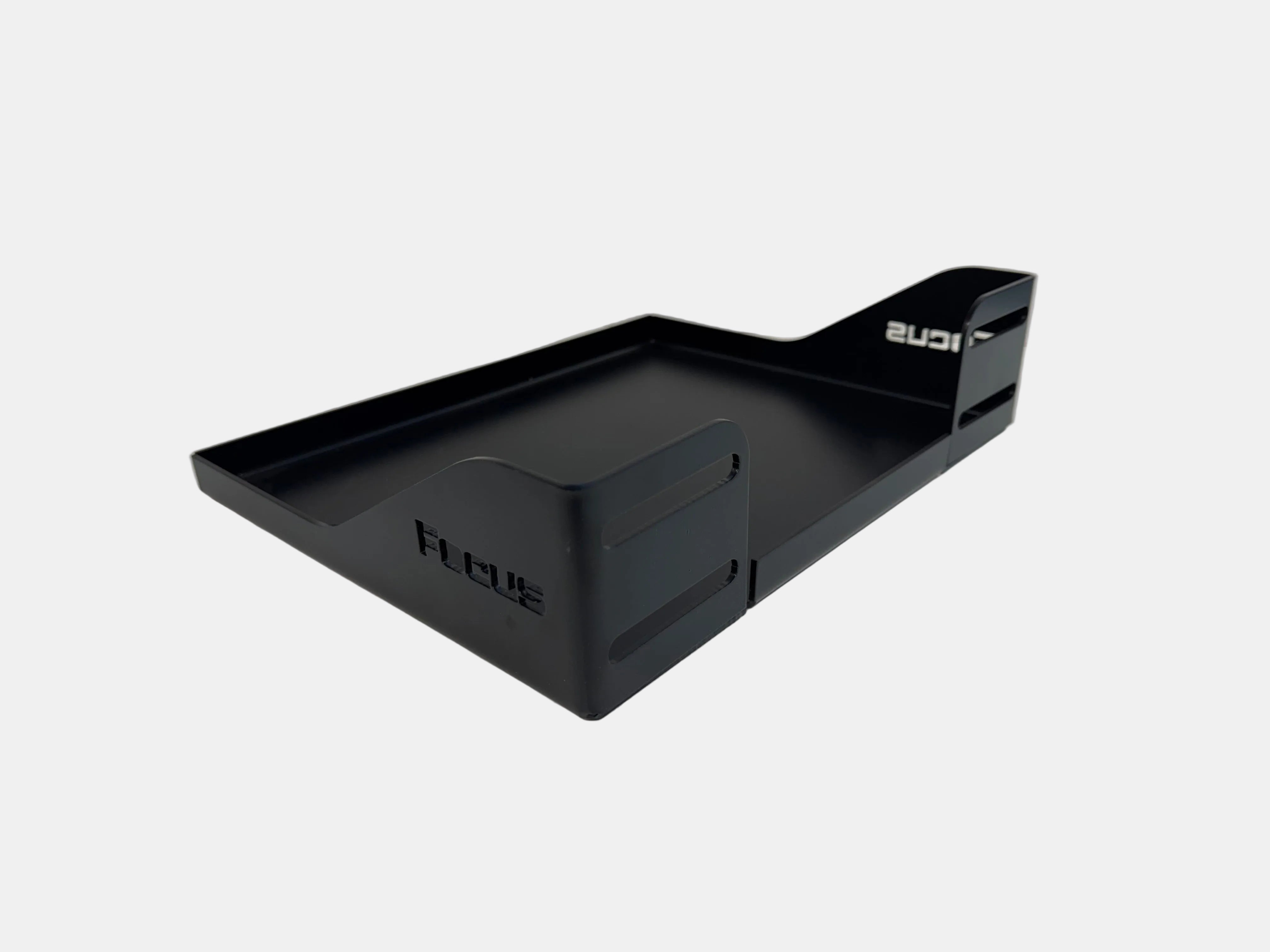 Black metal tray with 'Focus' branding on a white surface