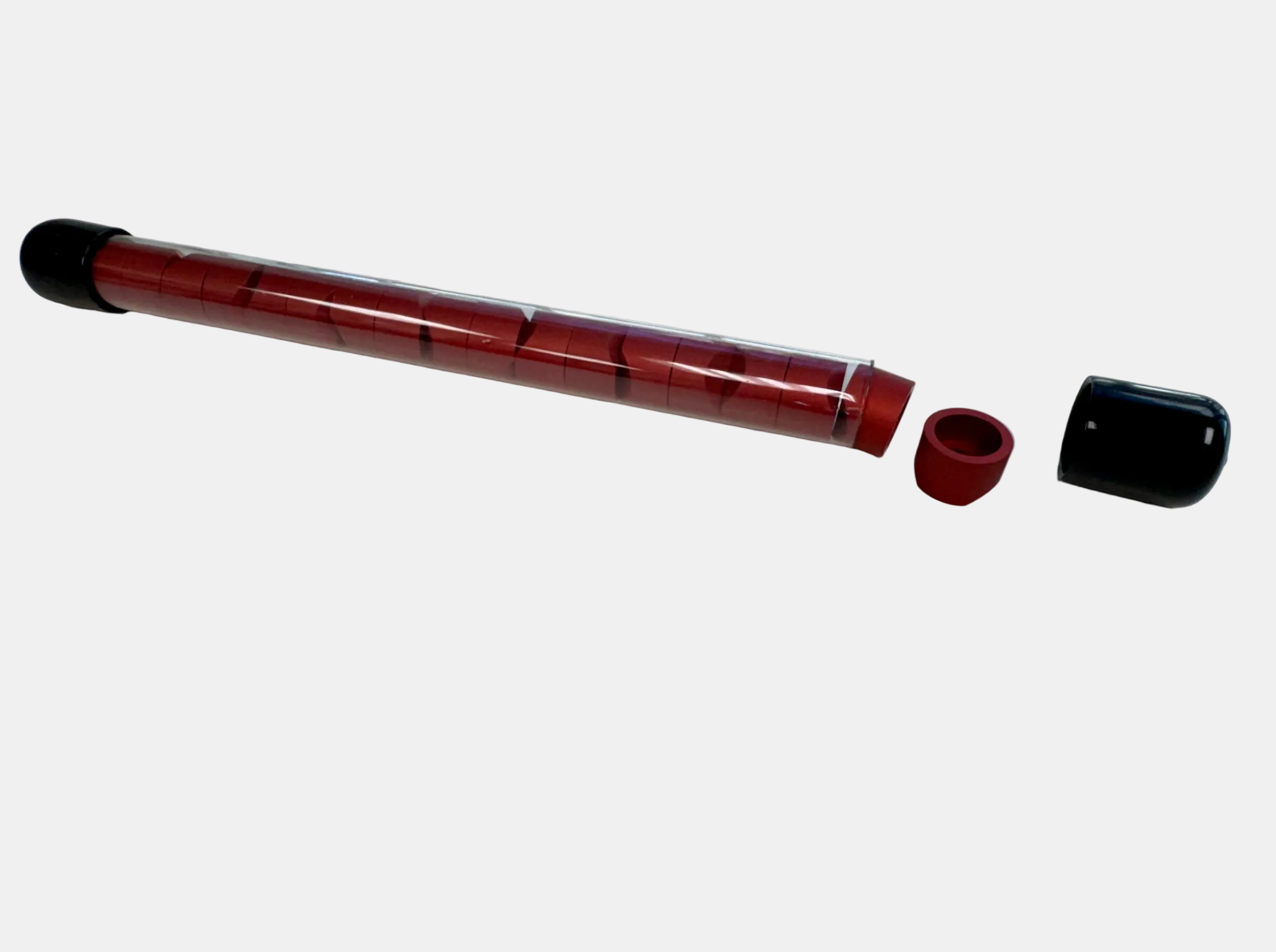 Red and black cylindrical object on a white background