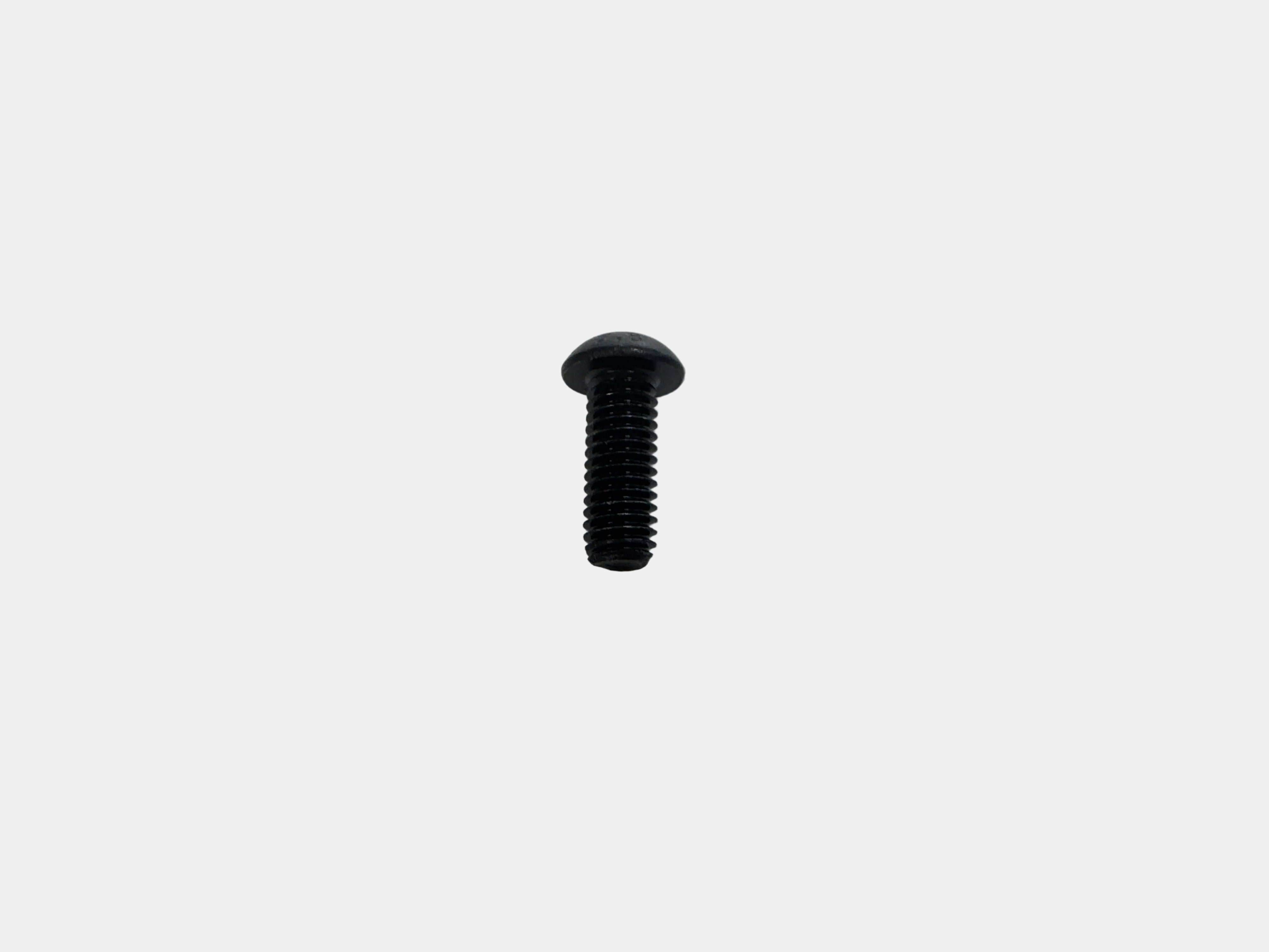 A single black flat-head screw with a threaded shank, photographed on a plain light gray background.