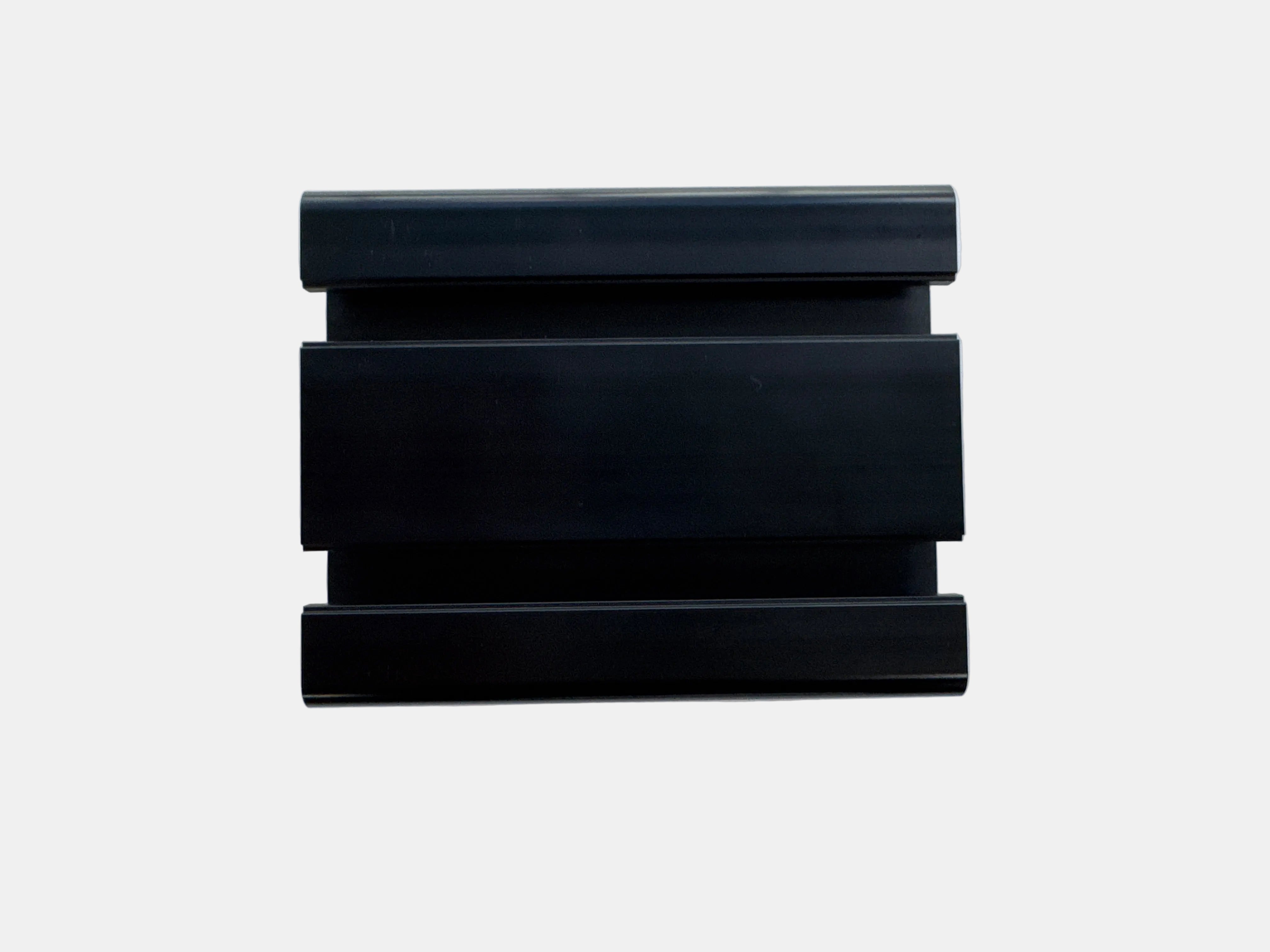 Three black rectangular metal mounting brackets or clips stacked vertically, shown from a top-down view on a light gray background.