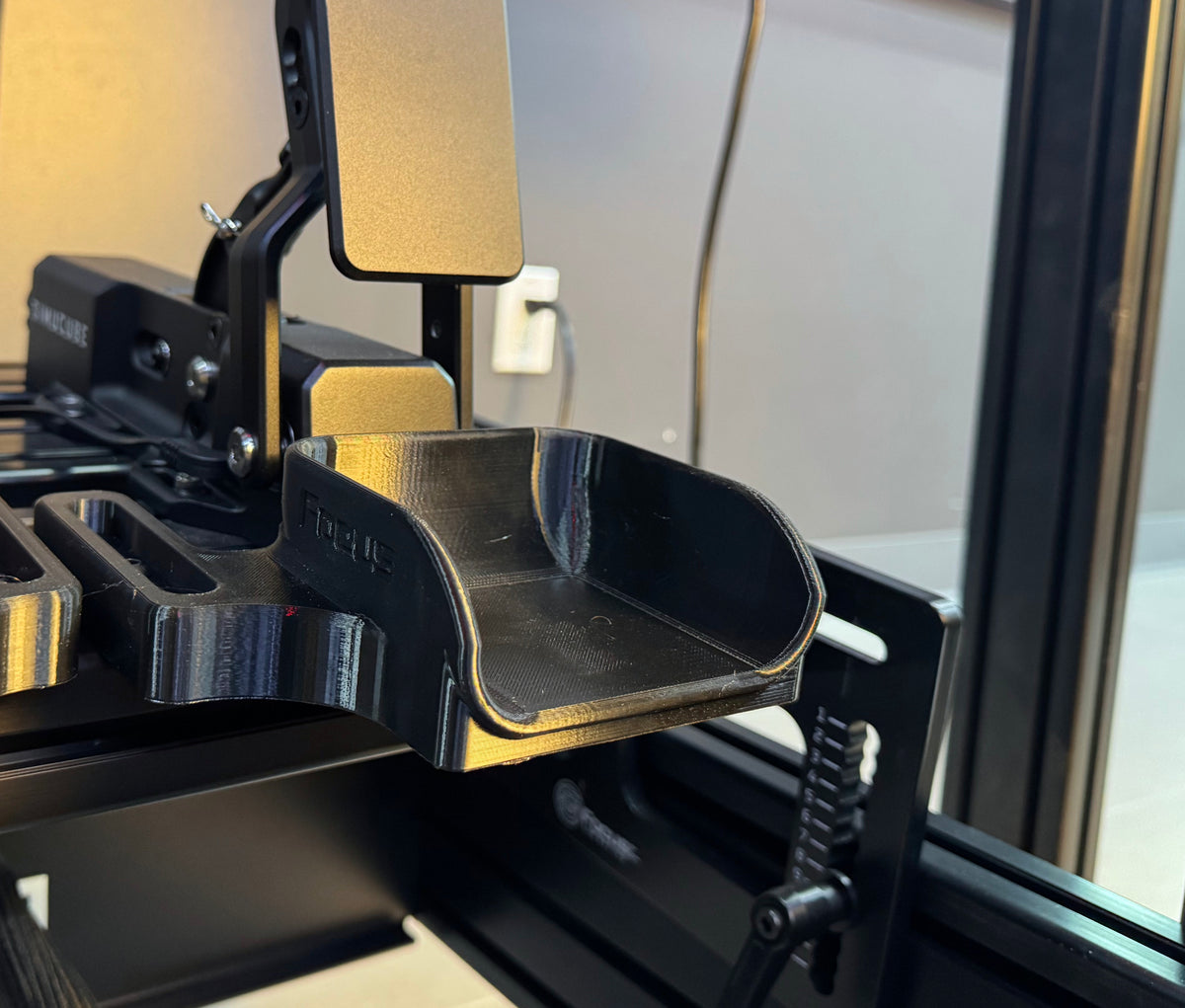 Close-up of an FSR heel cup mounted to cockpit extrusion below a pedal